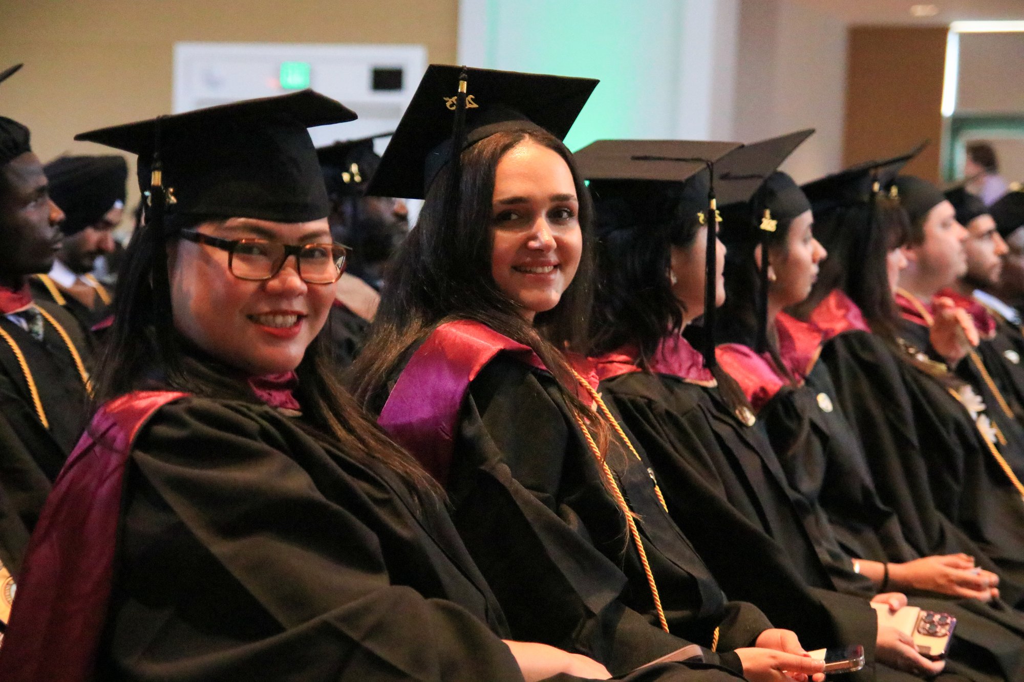CalMU doctoral graduates in regalia at commencement ceremony