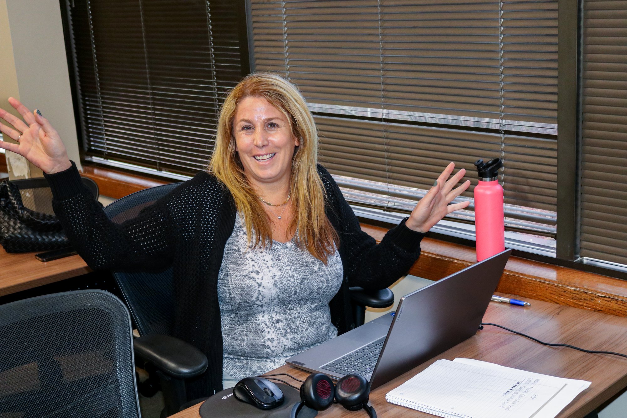 CalMU student waving during an online class session