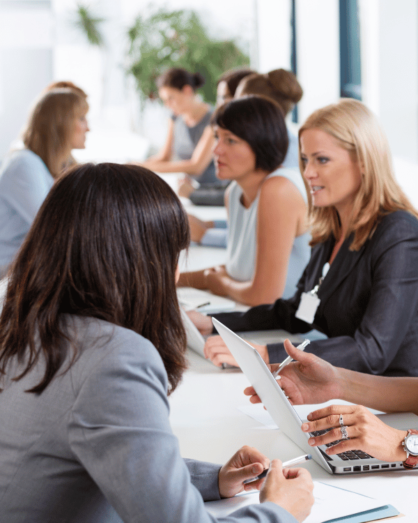 Business professionals collaborating in strategy meeting