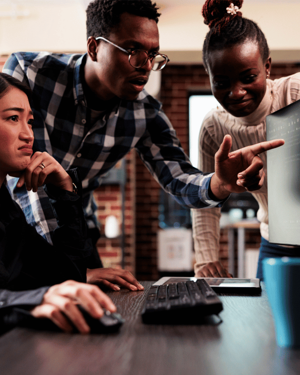 Technology professionals collaborating on screen analysis