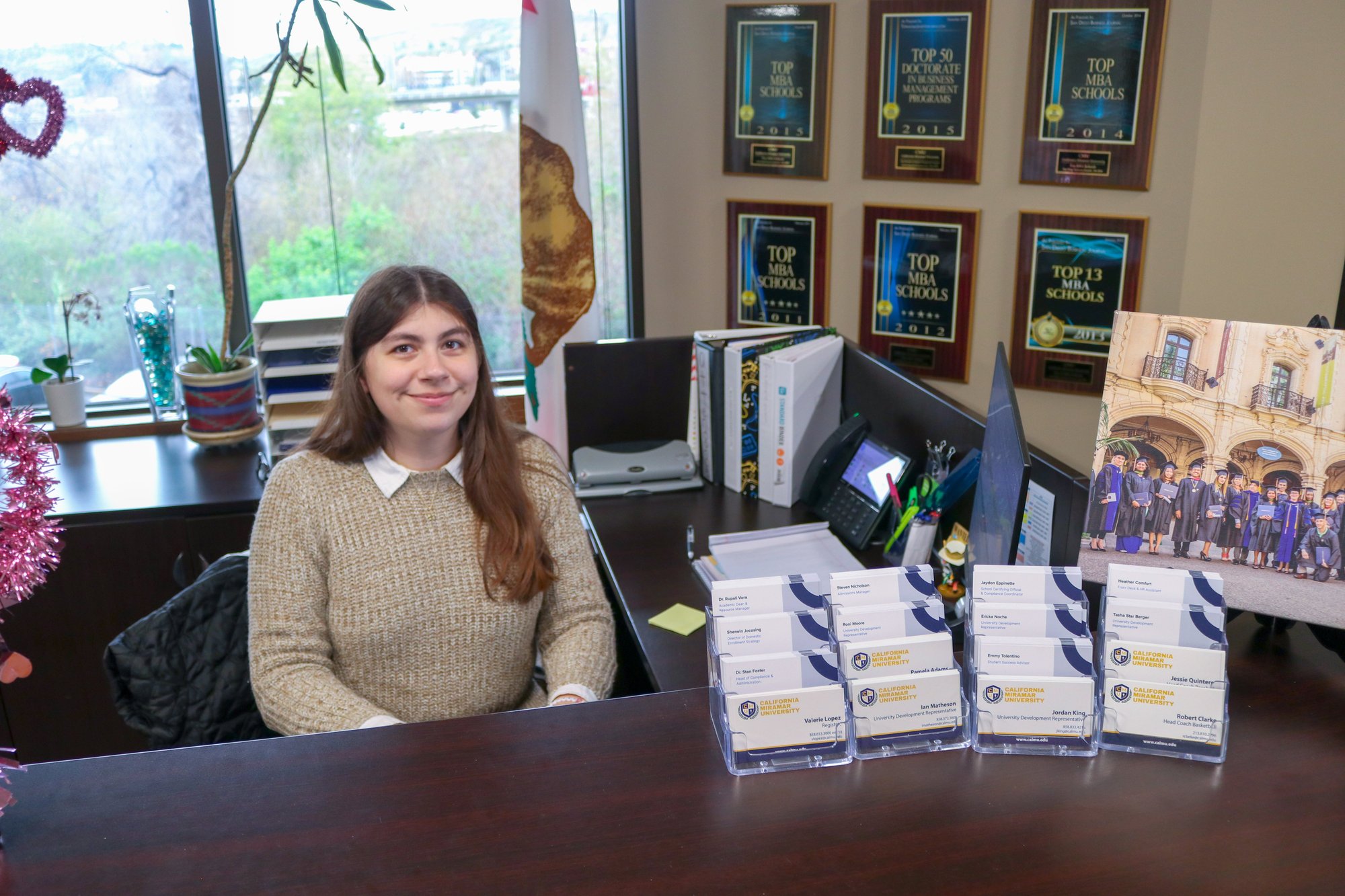 calmu staff member working at front desk